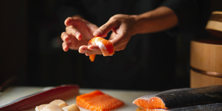 Chef Preparing Sushi. Photography By Chalee Foodies Studio. Image Via Shutterstock 750x375 