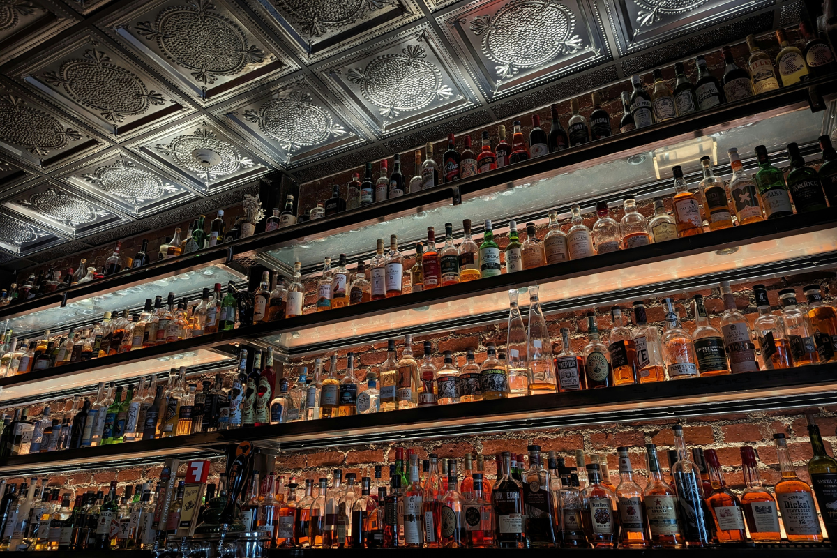 Wall of spirits. Photography by Charles Givens. Image via Unsplash