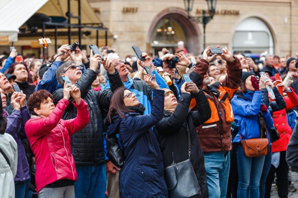 A multinational large crowd of tourists. Photography by frantic00 via Shutterstock