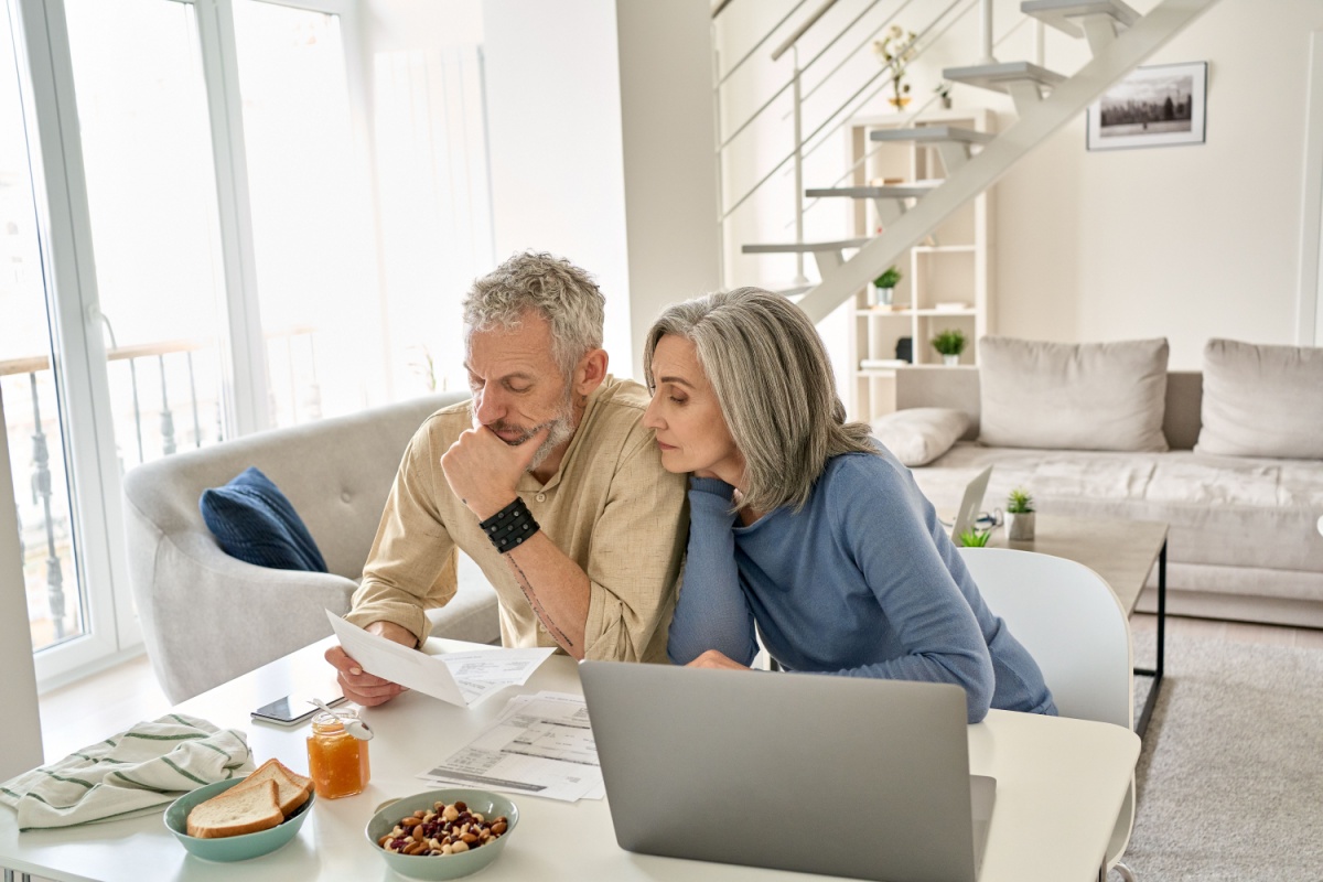 Worried old senior couple. Photography by Ground Picture via Shutterstock